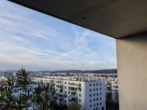 Bild - Helle und freundliche Vier-Zimmer-Wohnung mit Südwest-Loggia und Fernblick sowie Tiefgaragenplatz