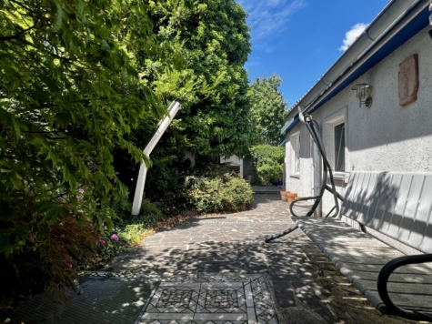 Idyllisches Einfamilienhaus mit Garten in ruhiger Umgebung nahe Biberhaufenweg, 1220 Wien, Einfamilienhaus