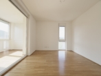 Bild - Exklusive Dachgeschoss-Maisonette mit supergroßer Terrasse und wunderbarem Fernblick & Tiefgaragenparkplatz