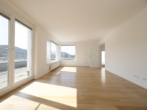 Bild - Exklusive Dachgeschoss-Maisonette mit supergroßer Terrasse und wunderbarem Fernblick & Tiefgaragenparkplatz